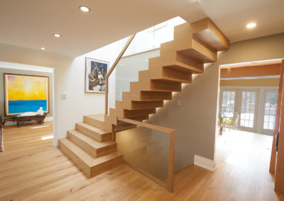 steps - stairs - lit - glass - wood railings - customized - wood floors